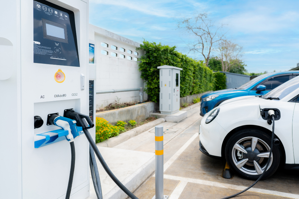 hybrid battery service, auto repair in York, PA at Quality Service Center. Image of electric vehicles connected to a charging station, underscoring the shop’s commitment to modern auto care and sustainable driving solutions.