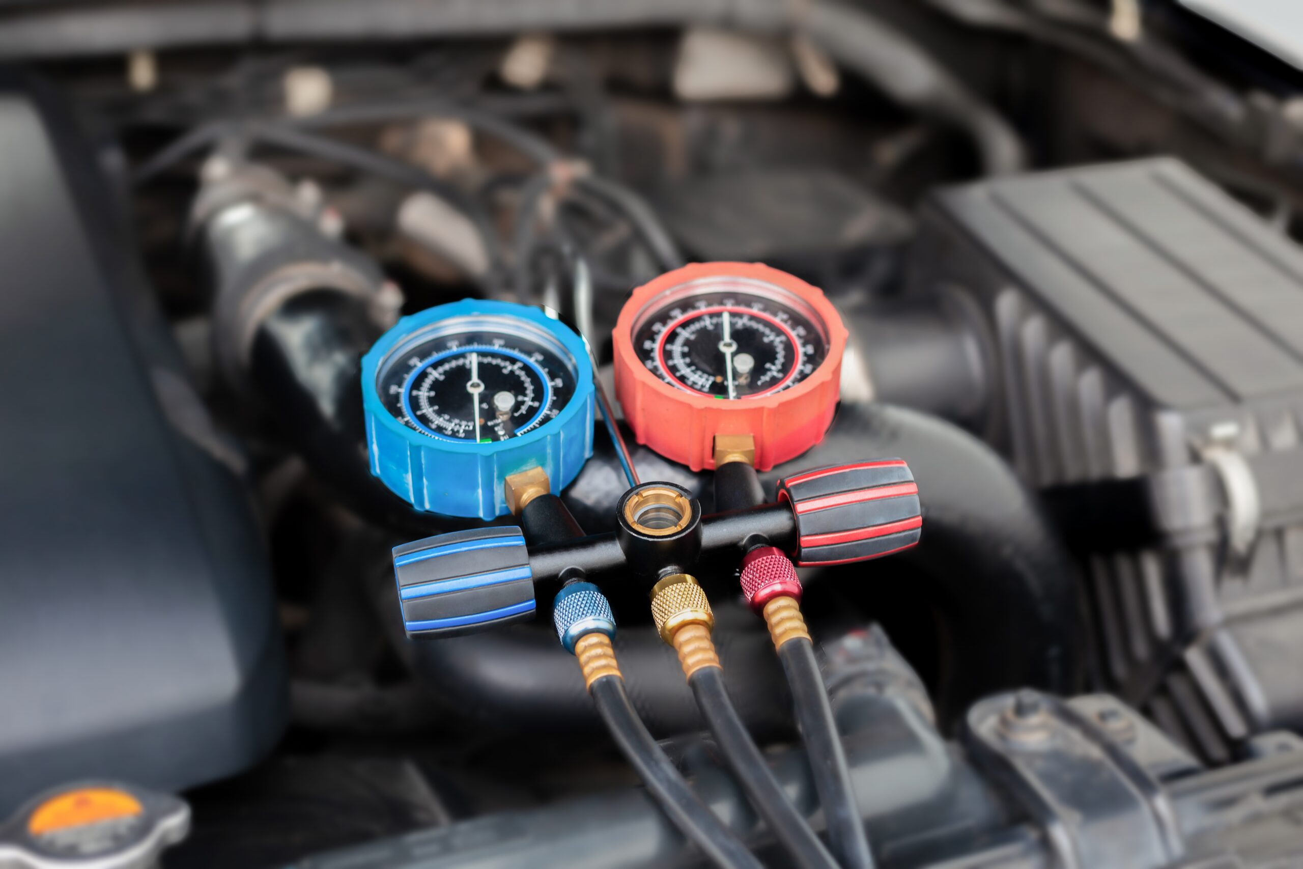 Auto A/C Repair in York, PA | Quality Service Center, view of repairing car's AC system